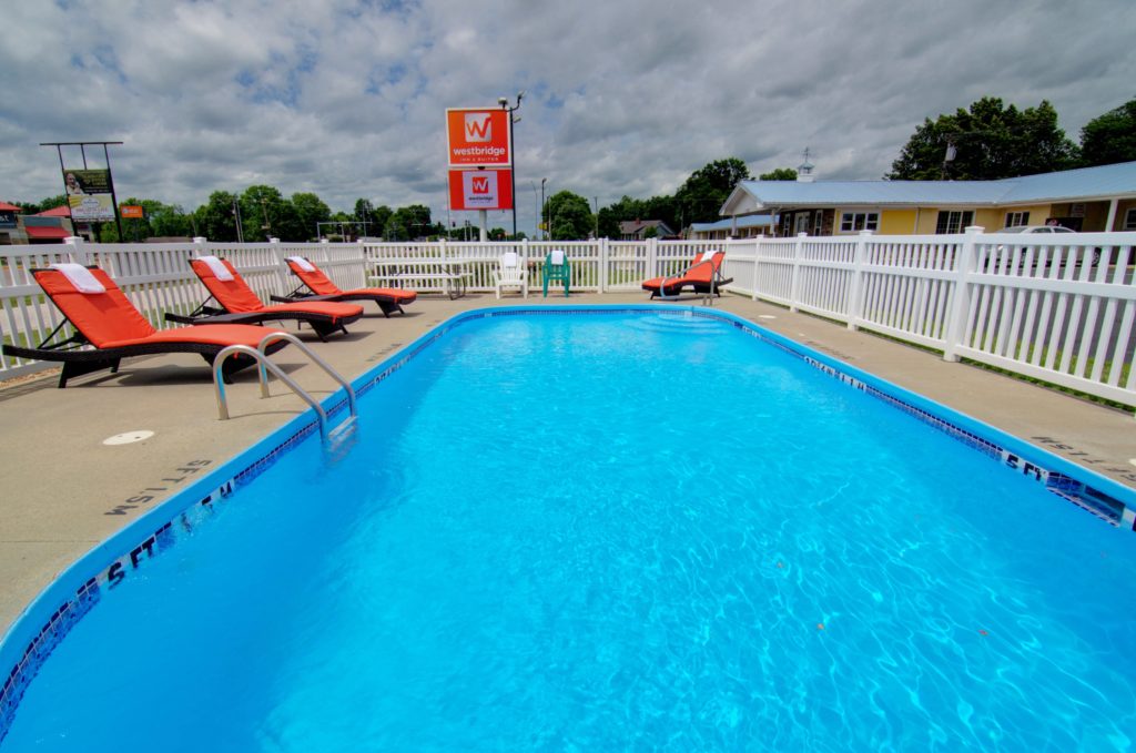 Seasonal outdoor pool at Westbridge Inn & Suites in Clinton, MO