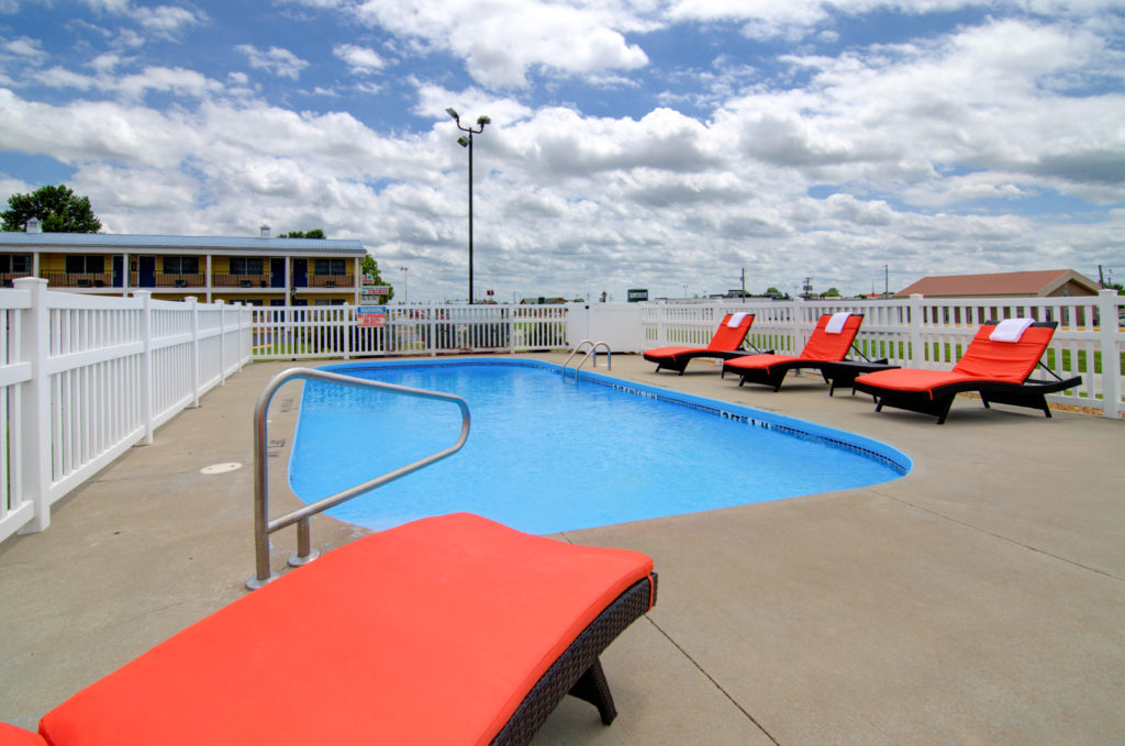 Queen Double room with two double beds at Westbridge Inn & Suites in Clinton, MO