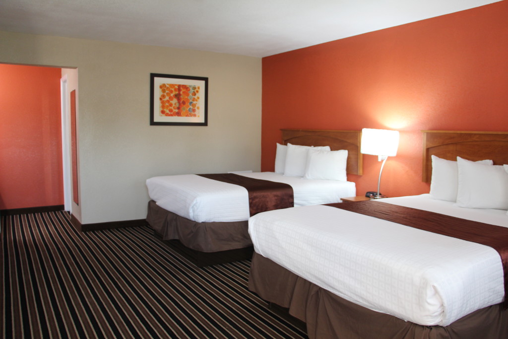 Queen Double room with two double beds at Westbridge Inn & Suites in Clinton, MO