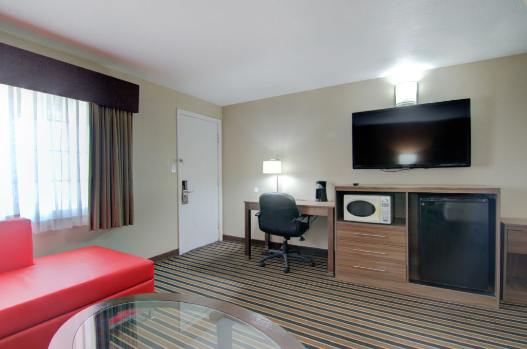 Renovated Standard Queen guest room at Westbridge Inn & Suites